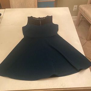 Green and black skater dress